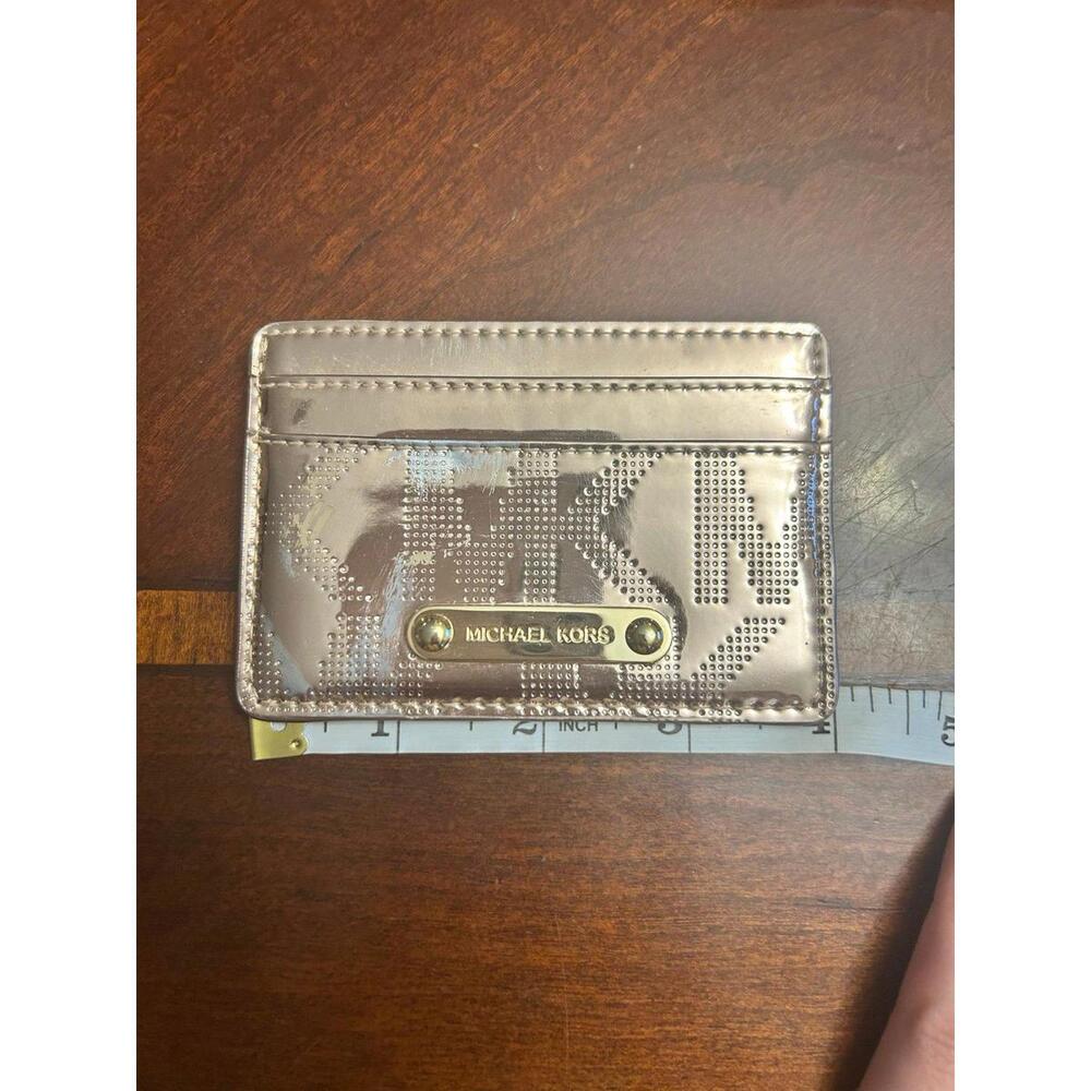 Rose gold discolored scratched  card holder